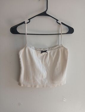STAUD Cream Lace-Trim Spaghetti Strap Crop Top with Black Bow